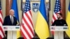 Президент України Володимир Зеленський і президент США Джо Байден (ліворуч). Київ, 20 лютого 2023 року