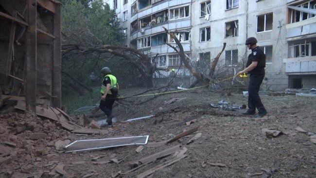 'Dad, She's Dead': Heartbreak After Russian Shelling Kills More Civilians In Kharkiv