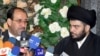 هشدار گروه صدر به المالکی درباره ديدار وی با بوش