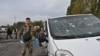 Представник поліції на місці удару російської ракети на околицях Запоріжжя, 30 вересня 2022 року 