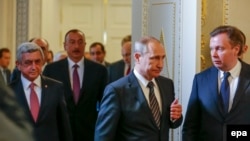 Russia -- Russian President Vladimir Putin (front C), Armenian President Serzh Sargsyan (L), Azerbaijan's President Ilham Aliyev (2-L) walk during their meeting in St. Petersburg, Russia, 20 June 2016.