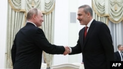 V.Putin və H.Fidan