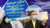 مصطفی تاجزاده به همراه همسرش
