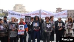 Armenia -- Relatives of people killed in the March 2008 post-election clashes protest in downtown Yerevan, 7 April 2010.
