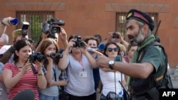 Armenia -- An armed man speaks to the press after pro-opposition gunmen locked in a week-long hostage standoff with Armenian authorities released the final four police officers held captive in Yerevan, July 23, 2016
