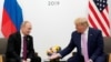 Владимир Путин һәм Доналд Трамп 2019 елда Япониядә "егермелек төркеме" саммитында