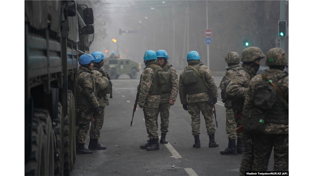 Kazakh troops are seen wearing UN helmets in Almaty on January 6.