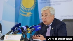 Ерлан Идрисов в службе центральных коммуникаций в бытность министром иностранных дел Казахстана
