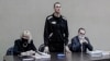 Олексій Навальний і його адвокати під час виїзного судового засідання у виправній колонії N2 у Покрові, Володимирська область, Росія, 15 лютого 2022 року