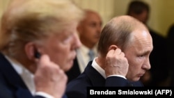 Дональд Трамп і Володимир Путін під час спільної прес-конференції e Гельсінкі 15 липня 2018 року