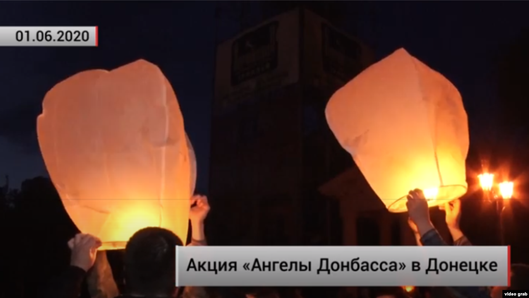 Акция с фонариками ко Дню защиты детей в Донецке: для российской пропаганды погибшие в начатой Кремлем войне дети – это жертвы «киевского режима»