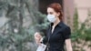 Armenia -- A woman wears a face mask in Yerevan, August 11, 2020.